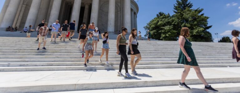 Students leave the Lincoln Memorial in a group.