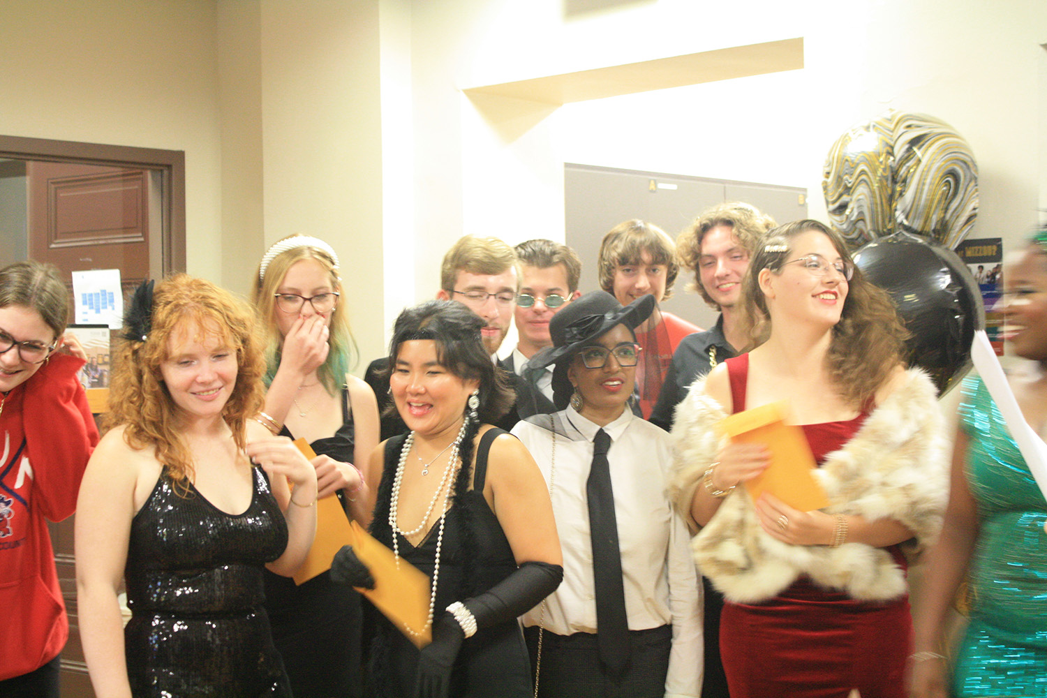 A group of students dressed up in costumes.