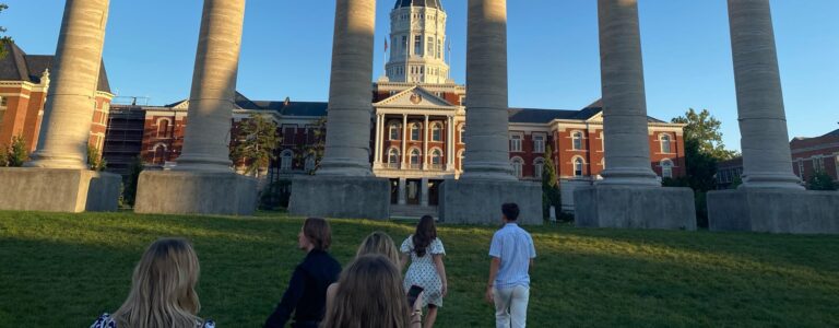Students approach the iconic columns in front of Mizzou's Jesse Hall.