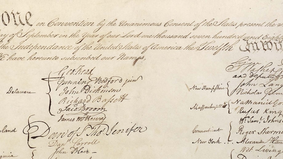 A close up image of signatures on the US Constitution